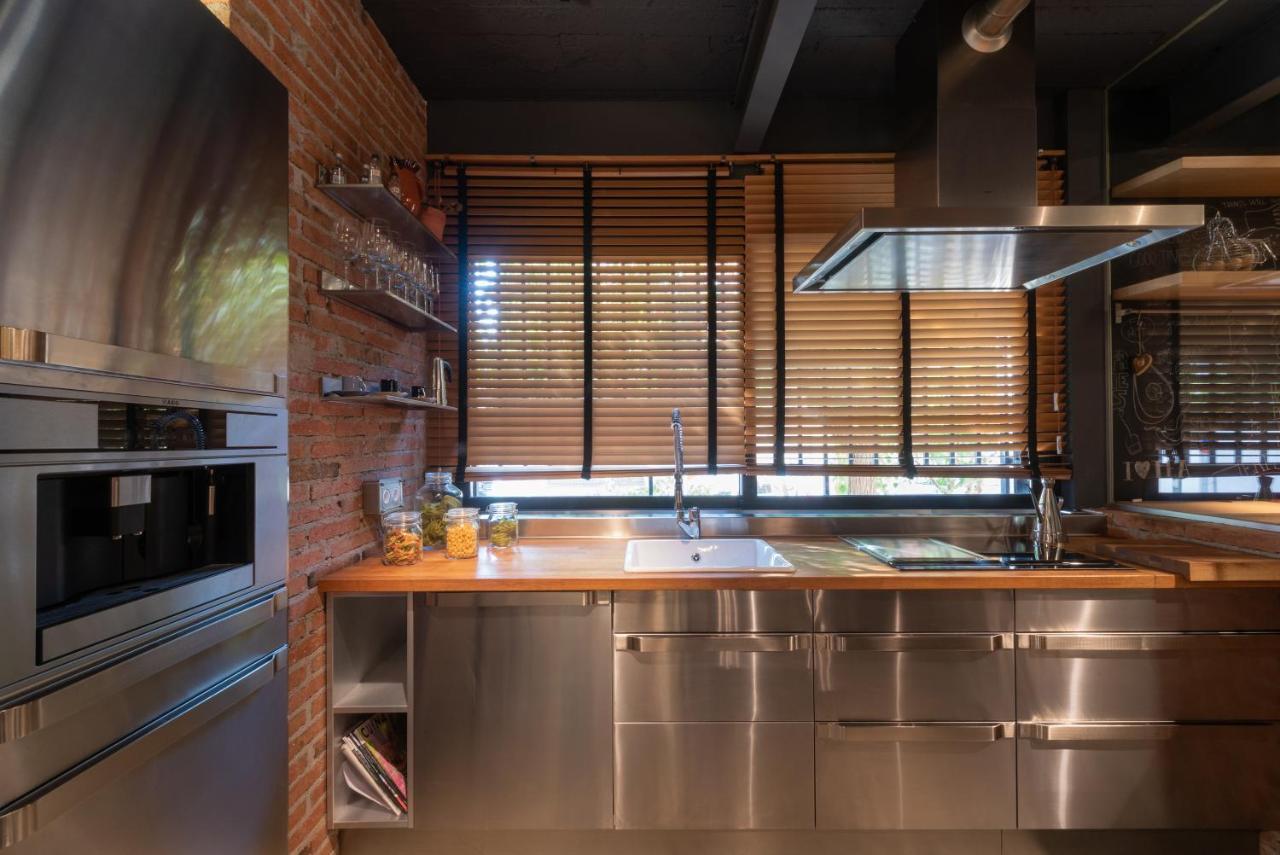 Petit Luxe Loft Apartment Terrassa Bagian luar foto